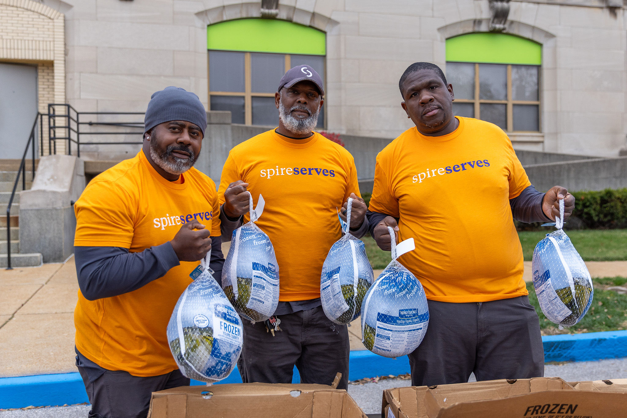 Spire employees at Thanksgiving Essentials Drive 