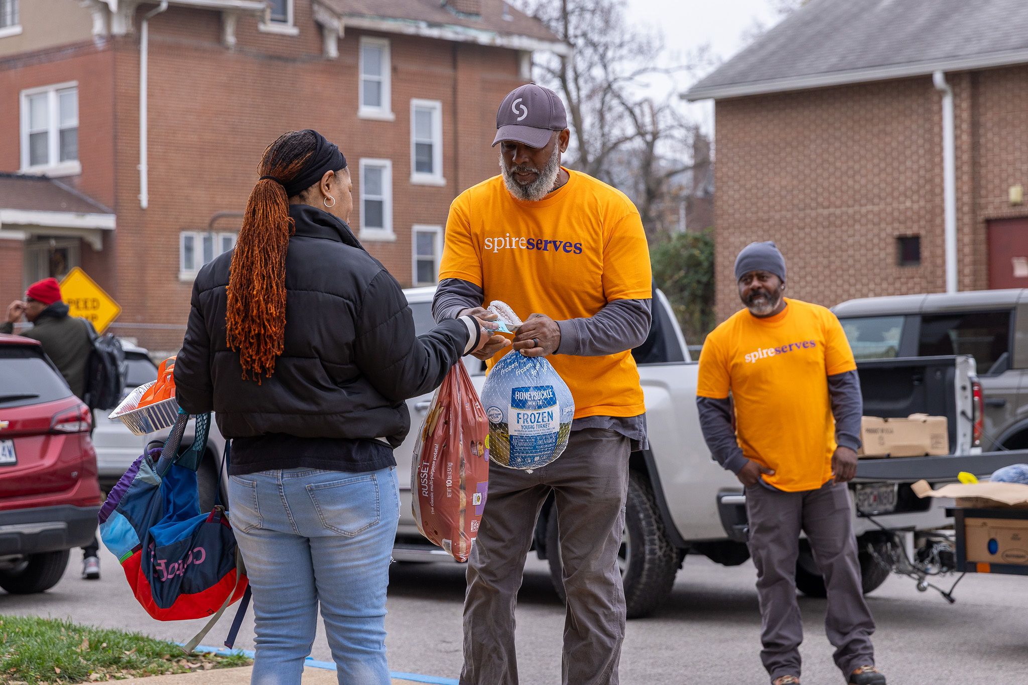 Spire employees at Thanksgiving Essentials Drive 