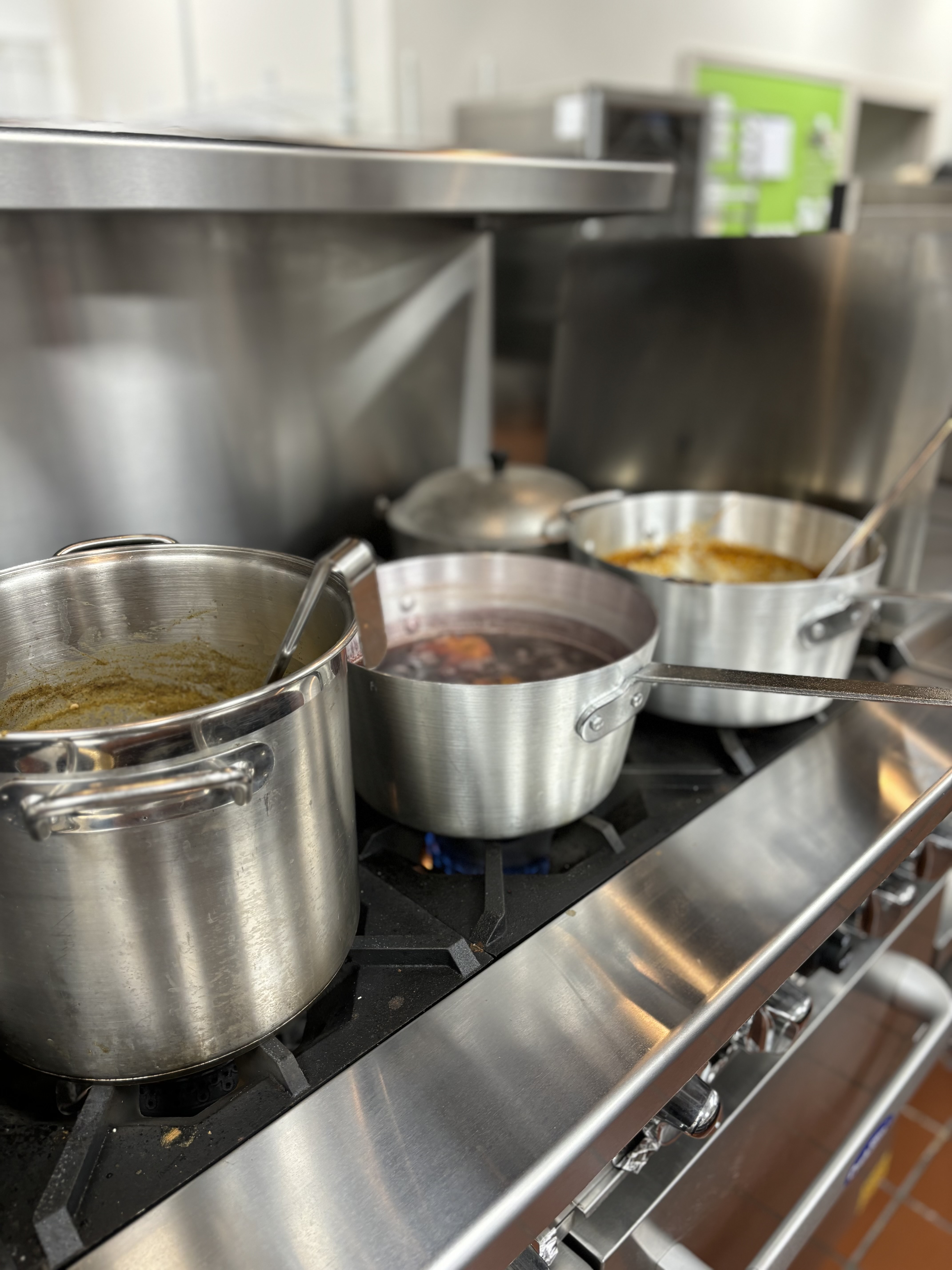 pots on the stove with soup