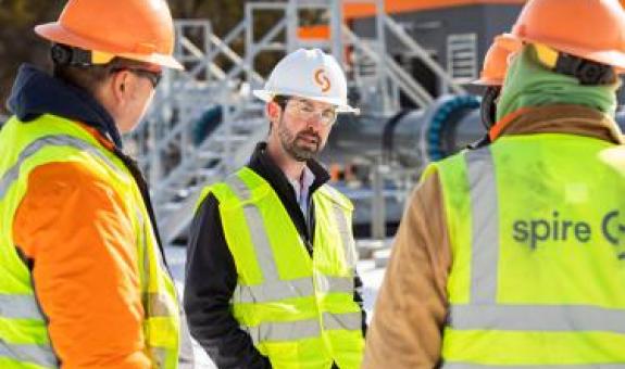 Spire employees in field
