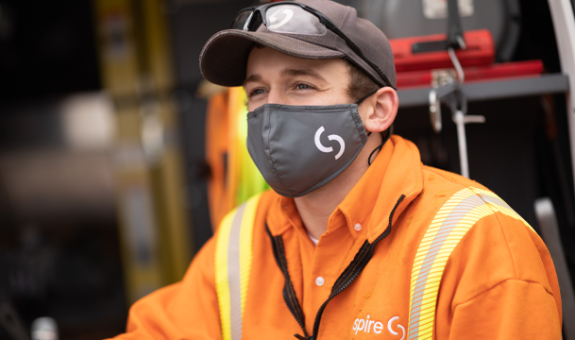 Spire field employee wearing mask