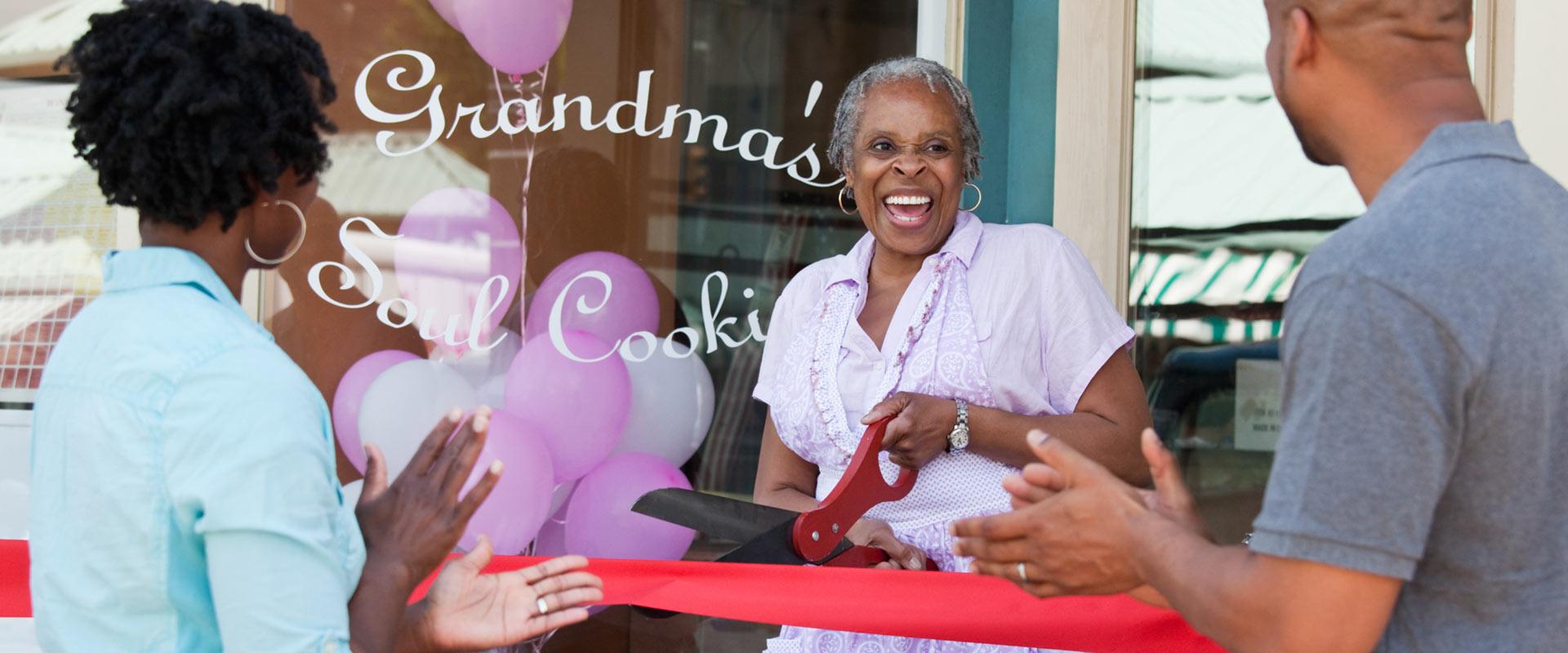 Woman opening cookie shop
