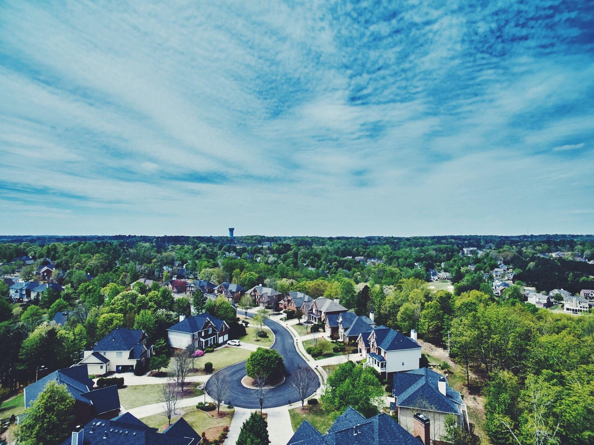 Image of: Overhead view of subdivision and blue sky
