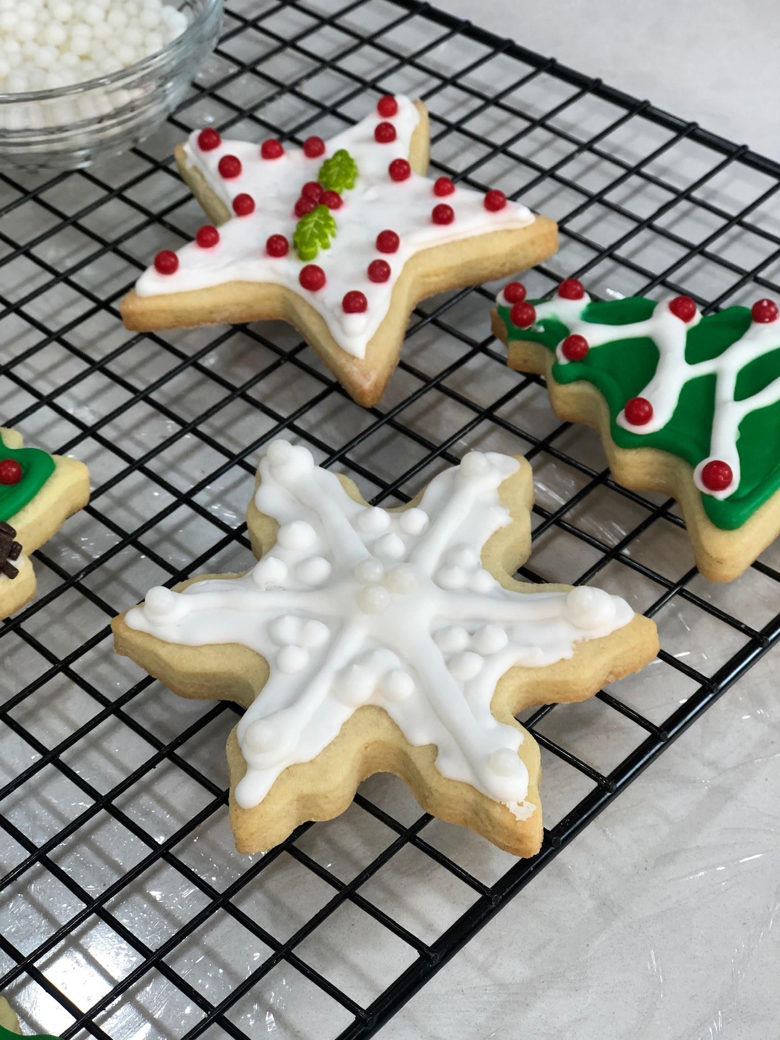 Image of sugar cookies decorated on a cooling rack