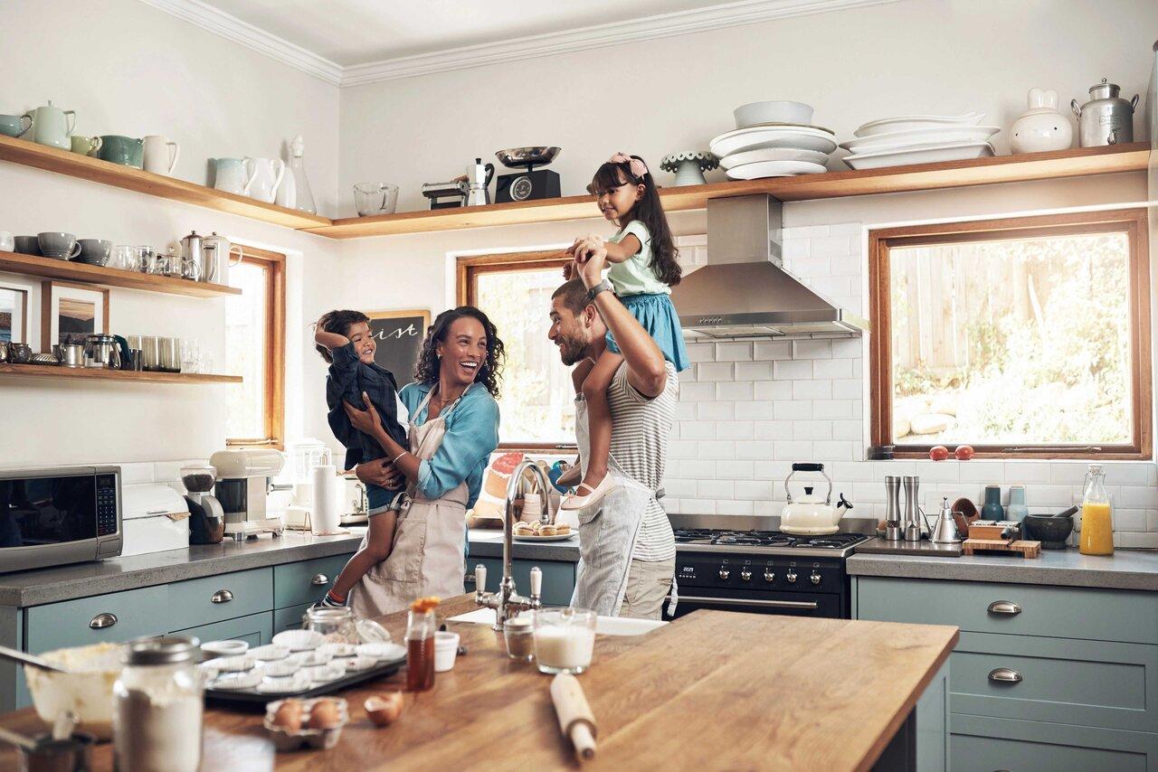 Image of family having fun in the kitchen