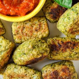 broccoli tots on a plate with sauce