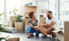 Image of family with moving boxes